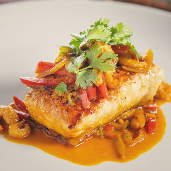 Contemporary Amazonian cuisine with seared fish at the Camu-Camu restaurant