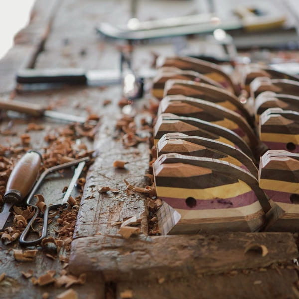 Artisan handcrafting reforestation wood in a Novo Airão workshop